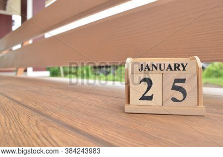 January 25, Number Cube With Wooden Balcony Background.