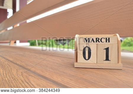 March 1, Number Cube With Wooden Balcony Background.