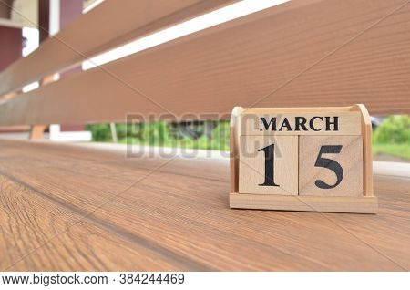 March 15, Number Cube With Wooden Balcony Background.