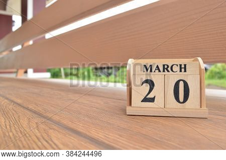 March 20, Number Cube With Wooden Balcony Background.