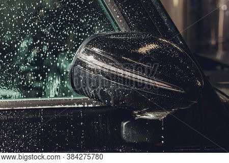 Close Up Of Paint Protection Film Installation On Side Mirror Of Modern Luxury Car. Ppf Is Polyureth