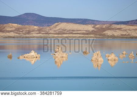 Tufa Spires Which Are Salt Formations On Mono Lake, Ca Surrounded By Arid Desert Terrain