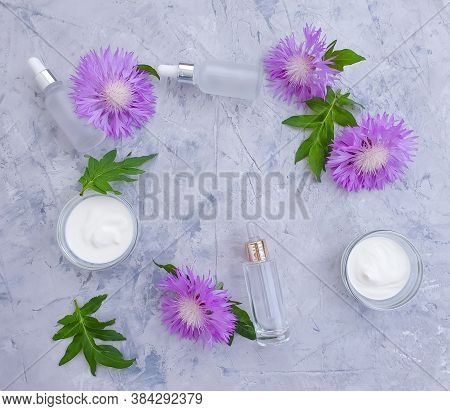 Cream Cosmetic Flower On Concrete Background Sample