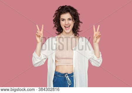 Portrait Of Happy Funny Excited Beautiful Brunette Young Woman With Curly Hairstyle In Casual Style