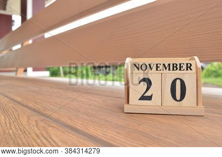 November 20, Number Cube With Wooden Balcony Background.