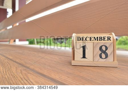 December 18, Number Cube With Wooden Balcony Background.