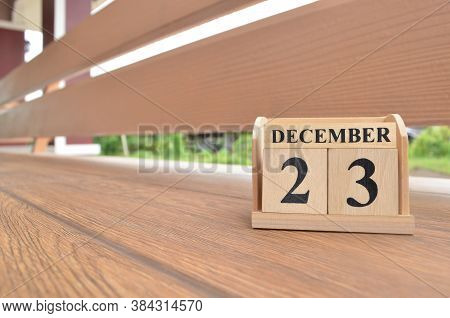 December 23, Number Cube With Wooden Balcony Background.