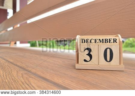 December 30, Number Cube With Wooden Balcony Background.