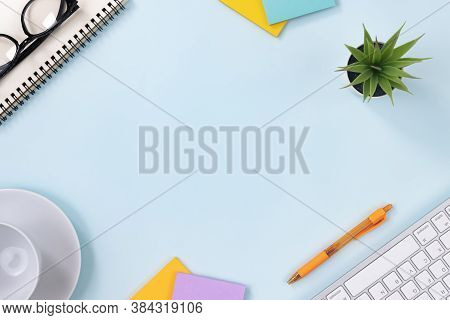 Modern Clean Office Desk Or Office Table On Top View And Stationery As Keyboard Spiral Notebook Pen 