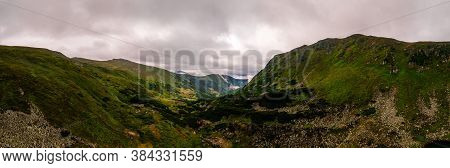 Camping In The Mountains, From A Height You Can See A Tent Camp Near The Alpine Lake Brebeneskul, A 