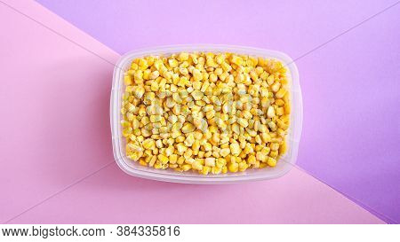 Corn In A Plastic Container For Long-term Storage. Deep Freezing Of Vegetables. Frozen Food Vegetabl