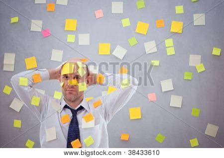 Businessman With Many Notes