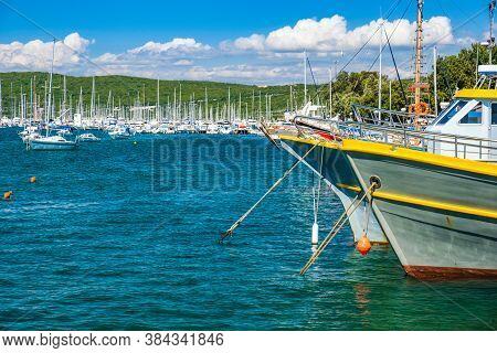 Waterfront And Old Ships In The Harbor In Town Of Punat On The Island Of Krk, Adriatic Coast, Croati