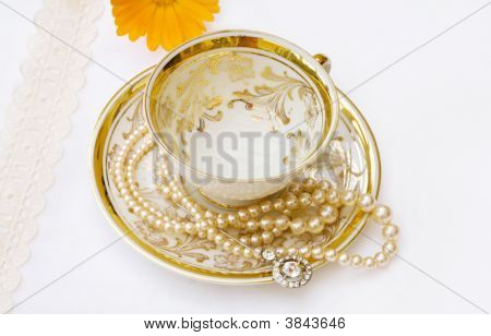 Vintage Golden tekopp med blomma