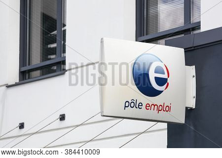 Villefranche, France - August 23, 2020: Pole emploi logo on a building. Pole emploi is a French governmental agency which registers unemployed people