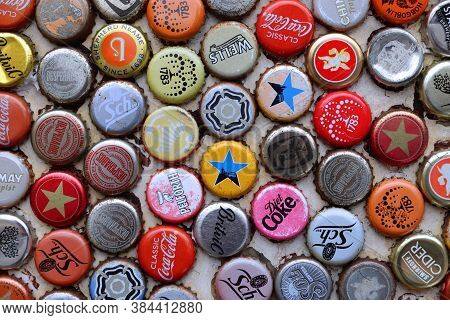 London, Uk - July 13, 2019: Mixed Beer And Non Alcoholic Beverages Metal Bottle Caps In London Uk.