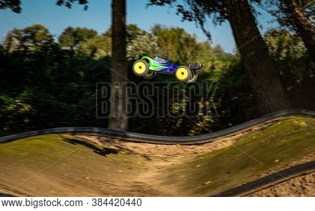 1/8 Offroad Rc Truggy Jumping On A Track