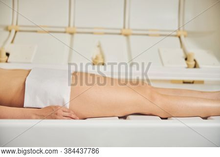 Towel Covering Intimate Zone During Beauty Procedure