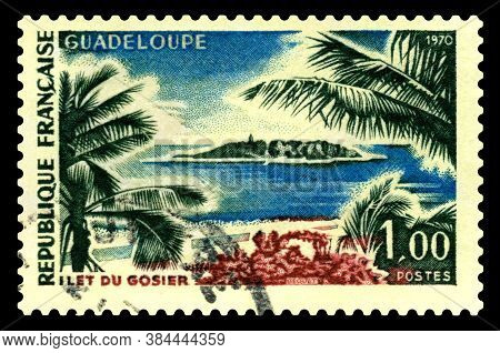 Stavropol, Russia - September 08 2020: A Stamp Printed In France Shows View Of Ilet Du Gosier Guadel