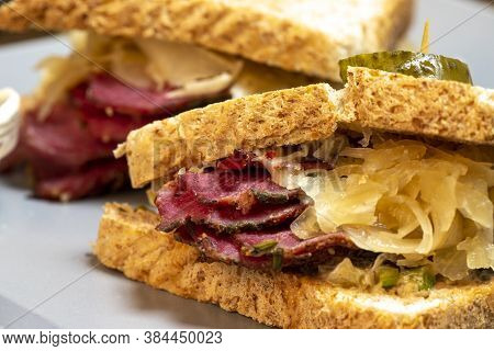 Reuben Sandwich On A Plate With Fries