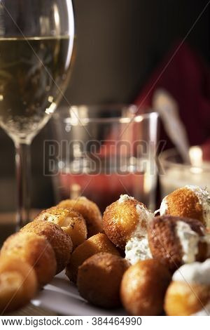 Fried Mozzarella Cheese Balls Mozarella Fritta, Appetizer. Glass Of Wine And Water On Background. Re