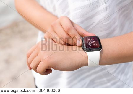 Woman With Smart Watch Checking Time Interval, Distance, Heart Rate And Burnt Calories Amount In Fit