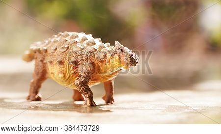 Ankylosaurus Was A Herbivorous Type Of Armored Dinosau, A Dinosaur From The Late Cretaceous. On Blur