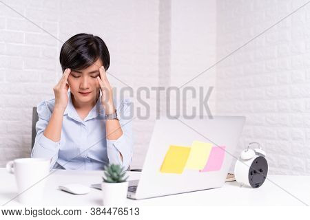 Woman Has Headache At Office Over Background