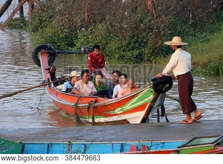 Yangon, Myanmar, Feb 25, 2019: Myanmar Traditional Ferry Landing And Sending Passenger Across Yangon