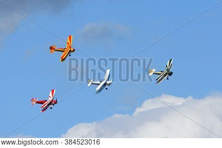 Ickwell, Bedfordshire, England - September 06, 2020: Vintage Tiger Moth Bi Planes Flying In Formatio