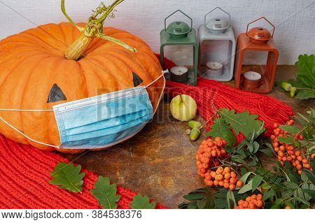 Still Life, Layout With A Warm Red Scarf, Oak Leaves, Candlesticks And Rowan Berries On A Brown Surf
