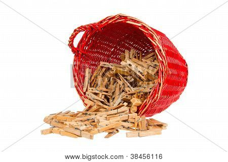 Very Old Red Basket With Wooden Clothespins