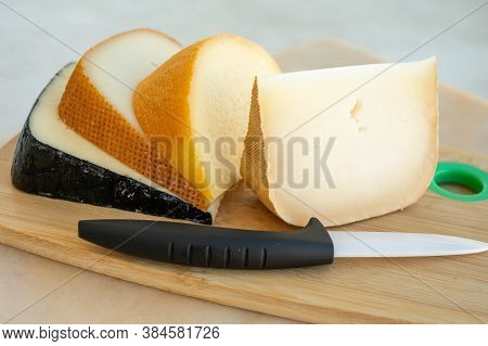 Cheese Collection, French Fol Epi  Cheese With Many Little Holes, Etorki, Tomme Noire Des Pyrenees A