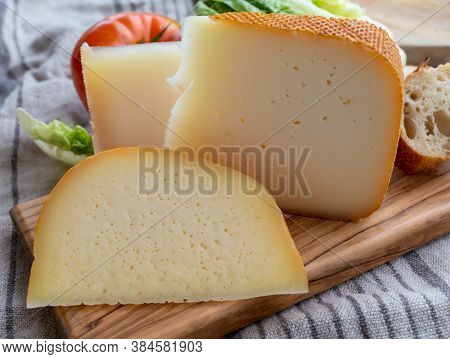 Cheese Collection, French Fol Epi  Cheese With Many Little Holes, Etorki  And Ossau Iraty Cheese