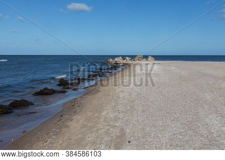 Cape Kolka - The Meeting Place Of The Baltic Sea And The Gulf Of Riga, Latvia. Ruins Of Old Lighthou
