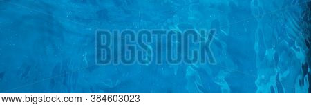Blue Water Texture As Abstract Background, Swimming Pool And Waves Design