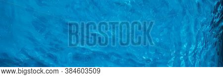 Blue Water Texture As Abstract Background, Swimming Pool And Waves Design