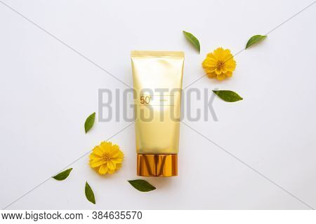 Natural Cosmetics Sunscreen Spf50 Health Care For Skin Face With Cosmos Flowers Of Lifestyle Woman  