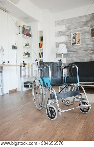 Wheelchair In Healthcare Room For Patients With Walking Illness. No Patient In The Room In The Priva