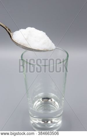 Transparent Glass Glass With Water And White Sorbent Powder For Treatment, Ingestion For Poisoning, 