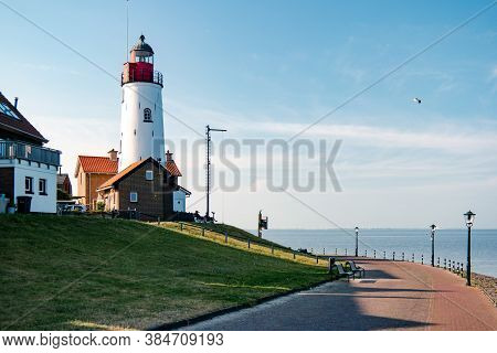Urk Netherlands Harbor And Lighthouse Near The Beach On A Bright Summer Day Flevoland Urk Netherland