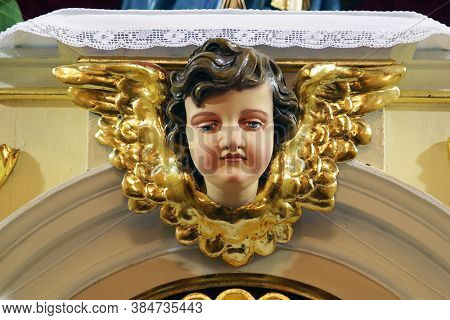 DONJA ZELINA, CROATIA - JUNE 26, 2013: Angel on the main altar in the parish church of Saint Nicholas in Donja Zelina, Croatia