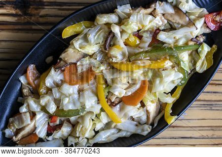 Healthy Snack Of Assorted Farm Fresh Roast Vegetables And Mushroms In A Plate On A Rustic Table, Clo