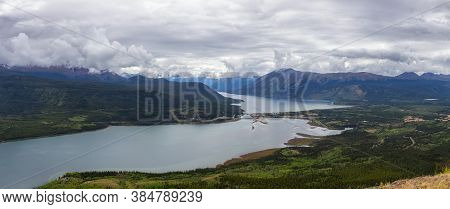 Beautiful Panoramic View Of A Small Touristic Town, Carcross, Surounded By Canadian Mountain Landsca