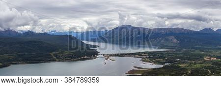 Beautiful Panoramic View Of A Small Touristic Town, Carcross, Surounded By Canadian Mountain Landsca