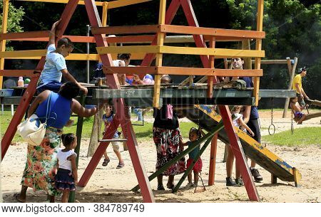 Salvador, Bahia / Brazil - May 4, 2014: Children Are Seen Playing In A Playground At Parque Da Cidad
