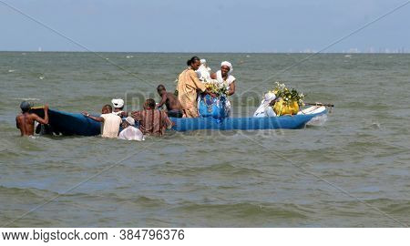 Santo Amaro, Bahia / Brazil - May 13, 2007: Candomble Supporters Are Seen During A Delivery Of Offer