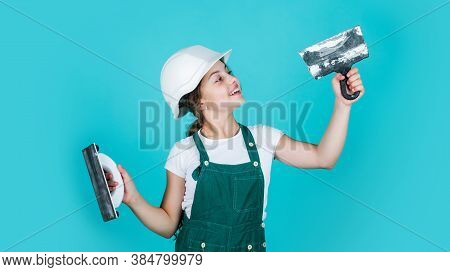 Confident Worker. Kid With Tool. Happy Small Construction Girl With Spatula. Teen Girl Use Putty Kni