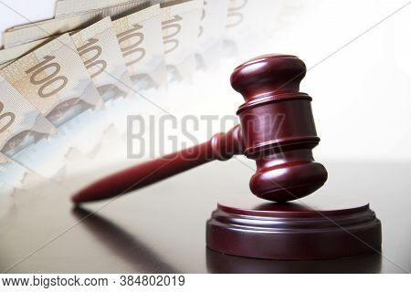 Judge Gavel With Money In Background, And Corruption.