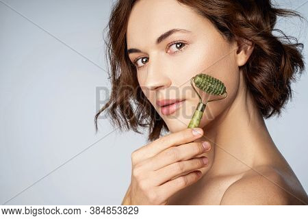 Jolly Beautiful Young Lady With Jade Massaget